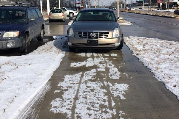 Car parked illegally on trail