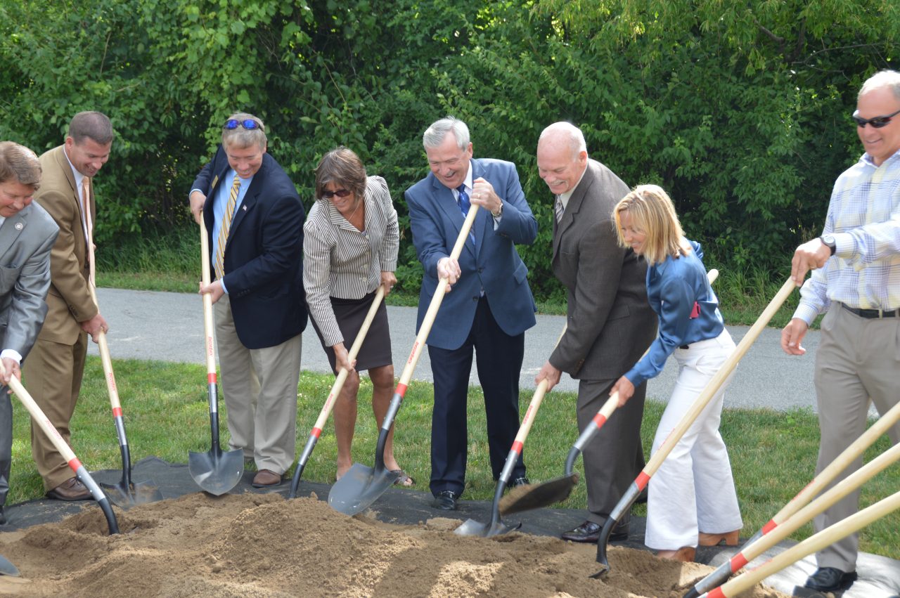 Mayor Henry and fort wayne trails board members with shovels at the Pufferbelly Groundbreaking